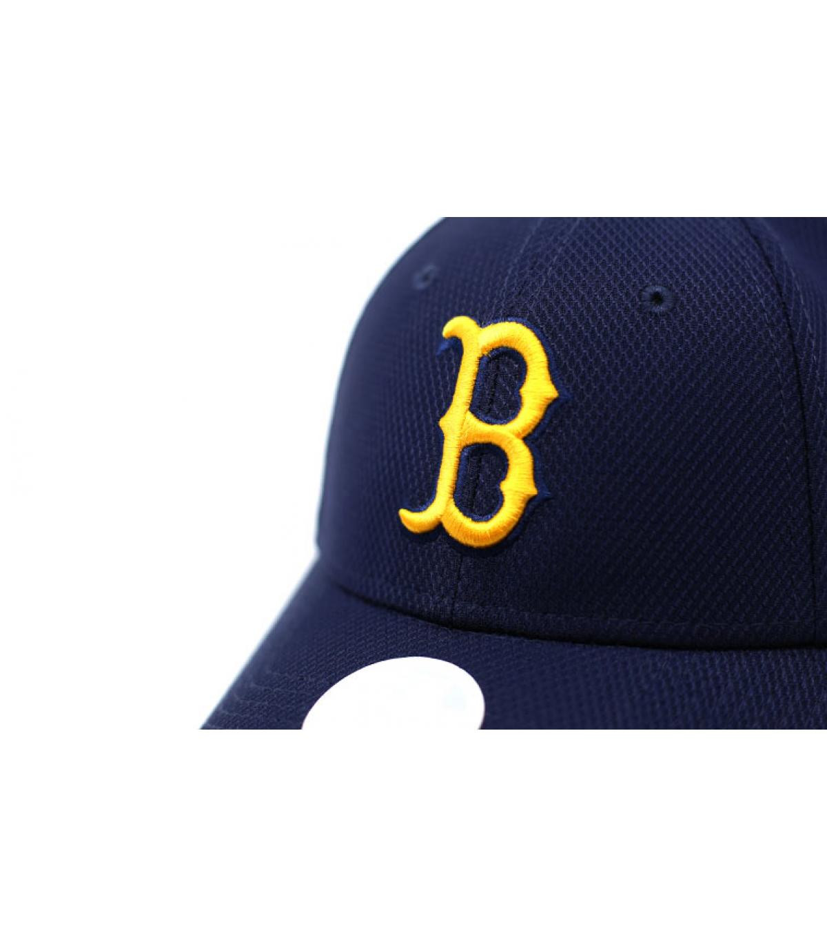 B women cap blue yellow